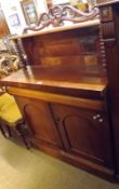A small late Victorian Mahogany Chiffonier, the single shelf back supported on turned columns to a