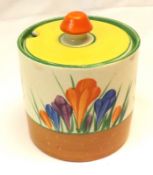 A Clarice Cliff Cylindrical Covered Preserve Pot, decorated with a Crocus pattern, Wilkinsons