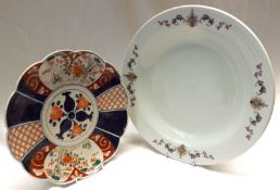 A Japanese Imari Circular Plate of shaped form, decorated in typical colours; together with a