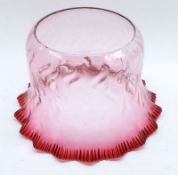 A Cranberry and clear glass frilled Oil Lamp Shade, 8” diameter
