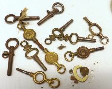 A packet containing eleven assorted Vintage Watch Winding Keys and odds, including Wristwatches