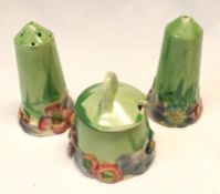 A Clarice Cliff “My Garden” Three Piece Cruet, the bodies all decorated with shaded green Delicia
