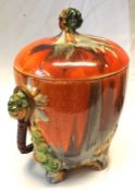 A Clarice Cliff “My Garden” Lidded Biscuit Barrel of tapering circular form with wicker looped