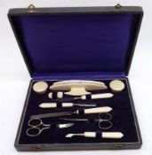 A cased Vintage Manicure Set in plush-lined case, ten pieces