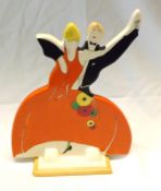 A Wedgwood copy of a Clarice Cliff Jazz Age Figure Group, 8 ½” high