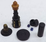 A Novelty Ebony and Fruitwood Needle Case modelled as a Lighthouse; plus further small Needle Case