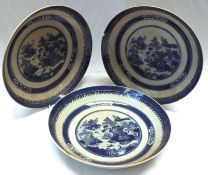 A set of three late 18th Century Chinese circular Dishes, the centres decorated in underglaze blue