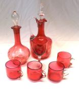 A Mixed Lot of Cranberry Glass: a Decanter with clear stopper and reeded handle, a shaft and bulb