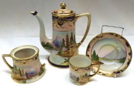 A Noritake part Coffee Set, comprises a Coffee Pot, two-handled Sugar Bowl (one handle broken),