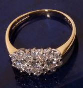 A hallmarked 18ct Gold seventeen brilliant cut Diamond Cluster Ring, oval shaped, approx 1ct total