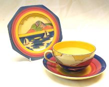 A Clarice Cliff Triple, comprising a Circular Cup and Saucer and an Octagonal Plate, decorated