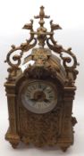 An early 20th Century Gilded Spelter Mantel Clock (formerly part of a garniture), crested with