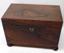 A 19th Century Rosewood Large Tea Caddy, of plain rectangular form, the interior with two fitted