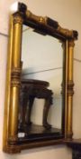 A 19th Century Rectangular Wall Mirror, the sides and top with gilt and black painted pillars and