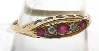 A hallmarked 9ct Gold Ring featuring three small Rubies and two small Diamonds to a pierced boat