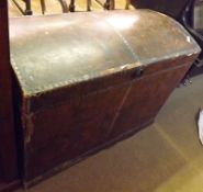 A late 19th/early 20th Century Dome Topped Travelling Trunk, with scrumbled finish, the front