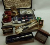 A cased of various mixed items to include Boxed Caverswall Thimbles, Boxed Ronson Lighter, various