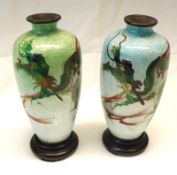 A pair of enamelled Oriental Baluster Vases, of circular tapering form, each decorated with