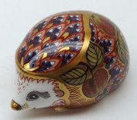 A Royal Crown Derby Paperweight “Orchard Hedgehog”, gilt button, boxed, 3 ½” long