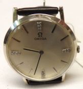 A Gents Vintage mid-grade precious metal Evening Watch, with silver batons to a silvered dial (