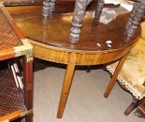 A 19th Century Mahogany demi-lune Side Table of typical form, raised on four chamfered legs, 48”