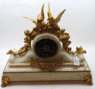 A late 19th Century large veined white Marble Mantel Clock, Brass bezel, circular face with gilded