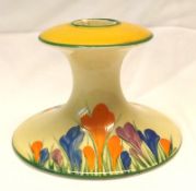 A Clarice Cliff Candlestick of spreading circular waisted form, decorated with a Crocus pattern,