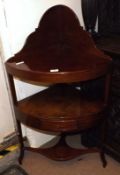 A 19th Century Mahogany Corner Wash Stand, of typical form, the top with galleried back to a further