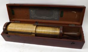 A Vintage Fullers Spiral Slide Rule, in fitted mahogany case, 17” long