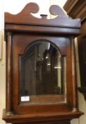A slim 18th Century Oak Longcase Clock Case (no movement) of plain design with single door, arched