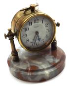 An early 20th Century French Alarm Clock “DEP”, Silvered circular face with black Arabic chapter
