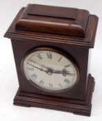 A 20th Century Walnut Cased Small Mantel Timepiece with domed top, over a circular silvered dial