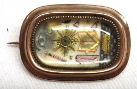 Of Masonic interest: a Gold Framed Masonic Brooch, featuring Eye, Star, Compass, Book etc,