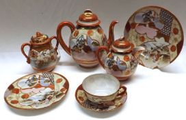 A Kutani style Oriental Tea Service, comprising of Teapot, Hot Water Jug, Lidded Sugar Bowl, two