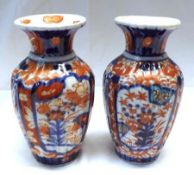 Two Japanese Imari Baluster Vases, each decorated in traditional colours, 6 ½” high