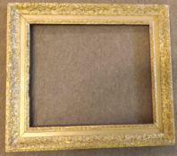 19TH CENTURY CARVED GILTWOOD PICTURE FRAME, 21” x 18”