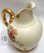 A small Royal Worcester Squat Vase, Reg No 29115, decorated with floral sprays on a cream background