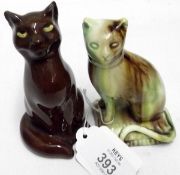 A treacle glazed Model of a seated cat, possibly Wheeldon manufacture, 4” high; together with a