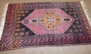 A Caucasian Rug with triple gull border and central geometric lozenge with insect designs, mainly