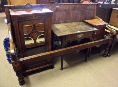 A 19th Century Mahogany Settle, five panel back, straight arms terminating in scrolls and plain