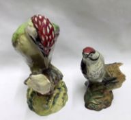 A Beswick Model of green woodpecker, No 1218; together with a Beswick Model of lesser spotted