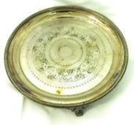 A Victorian Electroplated Salver, circular shaped with gadrooned rim and foliate engraved field,