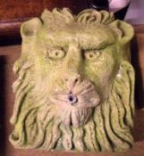 A French  Stone  Lion Mask Moulded Wall Fountain, of rectangular form, 12” high