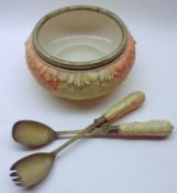 A Locke’s Worcester Salad Bowl with formerly silver plated rim and a pair of matching Servers (3)