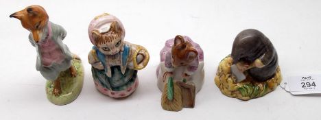 Four Beswick Beatrix Potter Models: “Diggory Diggory Delvet”, BP3B; “Hunca Munca Sweeping”, BP3B; “