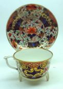 A 19th Century Crown Derby Tea Cup and Saucer, typically decorated in red, blue and gilt floral