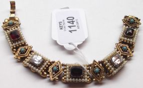 An unusual early/mid-20th Century coloured stone set Bracelet in Renaissance style