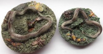 Two Portuguese Majolica Wall Plaques, modelled as snakes, lizards and insects on a moss