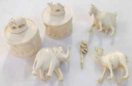 A collection of small Ivory items, comprising a Model Camel, a Model Elephant and a Model Goat (