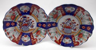 A pair of Japanese Imari Circular Plates, decorated in the typical manner in traditional colours,